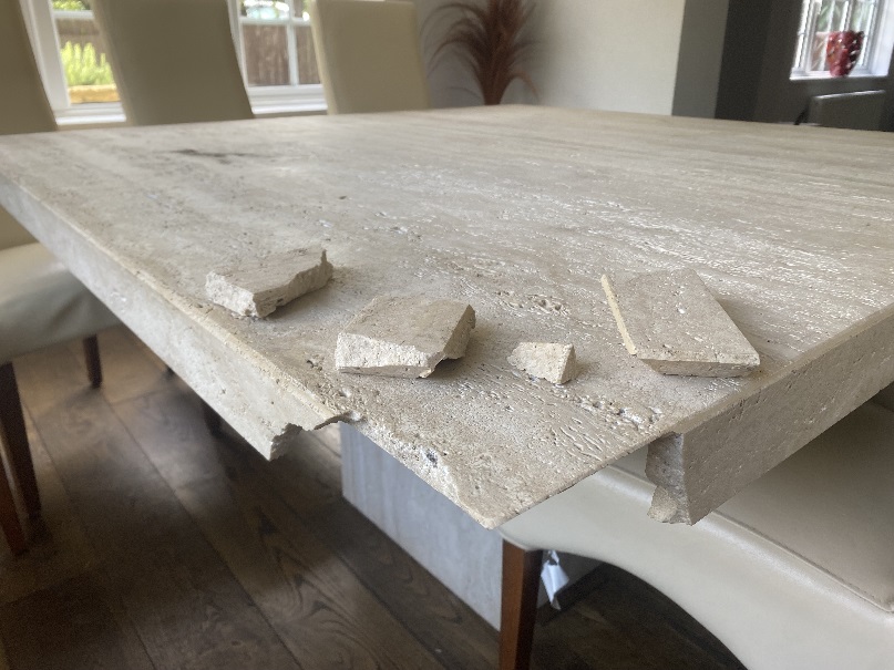 Damaged Stone Table Before Repair Reading
